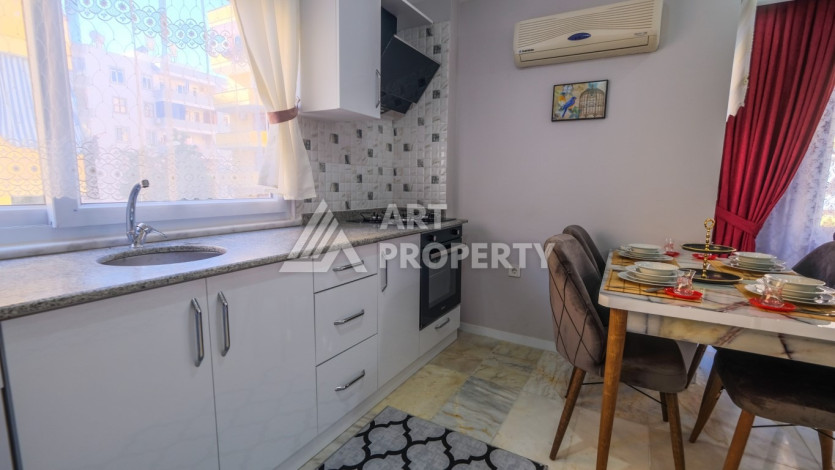 Квартира 1+1,  с общей площадью 55м2, в 300 метрах от моря, в районе Махмутлар - Ракурс 3