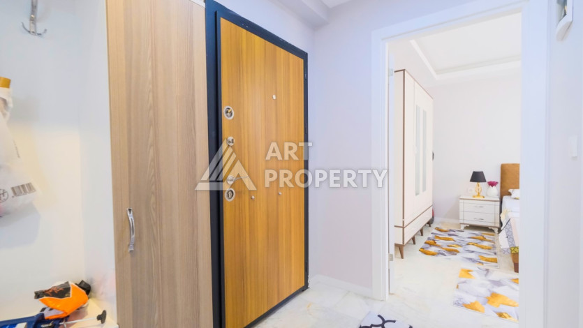 Квартира 1+1,  с общей площадью 55м2, в 300 метрах от моря, в районе Махмутлар - Ракурс 5