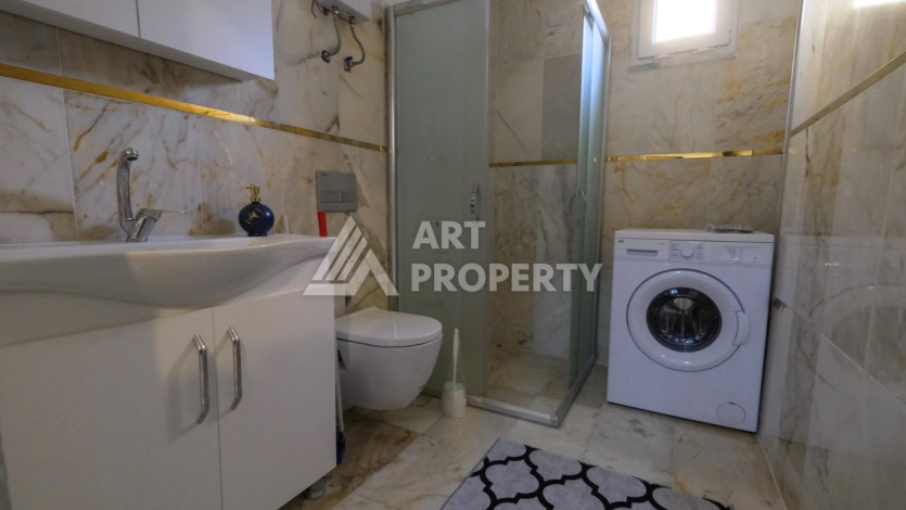 Квартира 1+1,  с общей площадью 55м2, в 300 метрах от моря, в районе Махмутлар - Ракурс 6