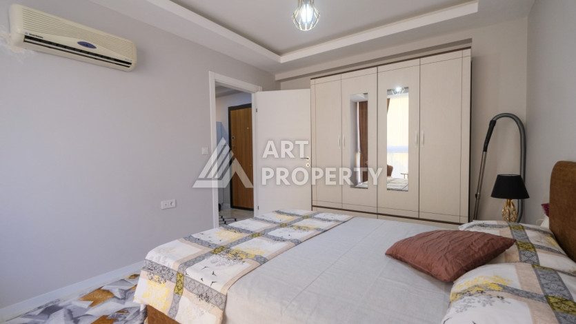 Квартира 1+1,  с общей площадью 55м2, в 300 метрах от моря, в районе Махмутлар - Ракурс 7