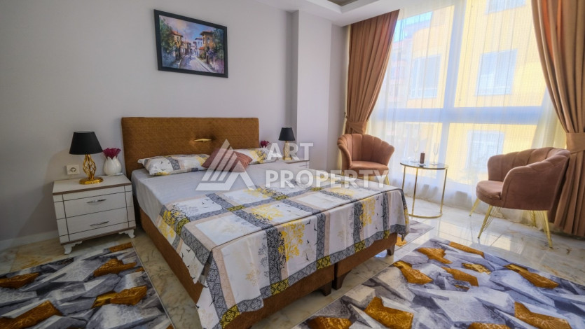 Квартира 1+1,  с общей площадью 55м2, в 300 метрах от моря, в районе Махмутлар - Ракурс 8