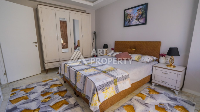 Квартира 1+1,  с общей площадью 55м2, в 300 метрах от моря, в районе Махмутлар - Ракурс 9