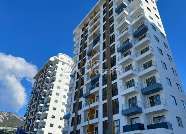 Апартаменты с восхитительным панорамным видом на море и город в районе Махмутлар, 1+1, 50м2 - Ракурс 0