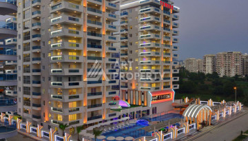 Апартаменты в одном из лучших жилых комплексов в районе Махмутлар планировки 1+1, 55м2 - Ракурс 11