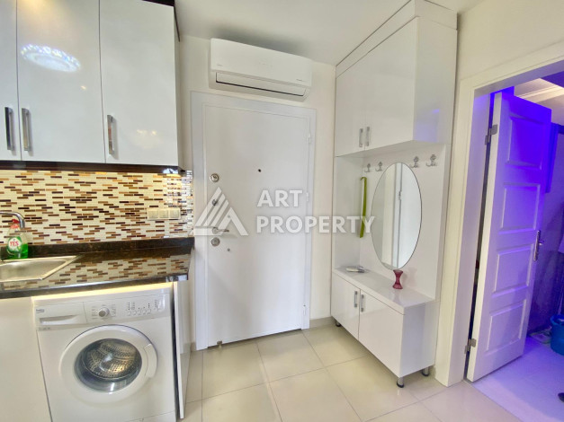 Апартаменты в одном из лучших жилых комплексов в районе Махмутлар планировки 1+1, 55м2 - Ракурс 12