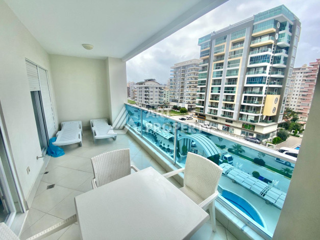 Апартаменты в одном из лучших жилых комплексов в районе Махмутлар планировки 1+1, 55м2 - Ракурс 14