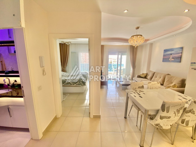 Апартаменты в одном из лучших жилых комплексов в районе Махмутлар планировки 1+1, 55м2 - Ракурс 15