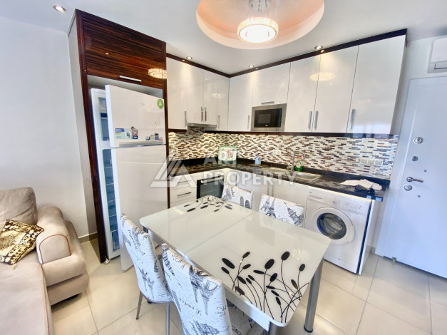 Апартаменты в одном из лучших жилых комплексов в районе Махмутлар планировки 1+1, 55м2 - Ракурс 16