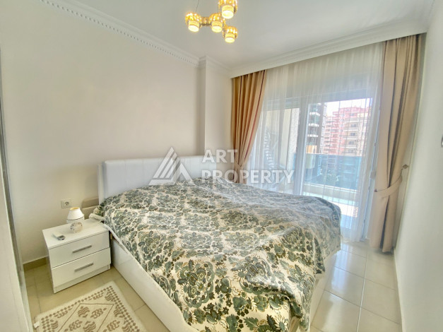 Апартаменты в одном из лучших жилых комплексов в районе Махмутлар планировки 1+1, 55м2 - Ракурс 17