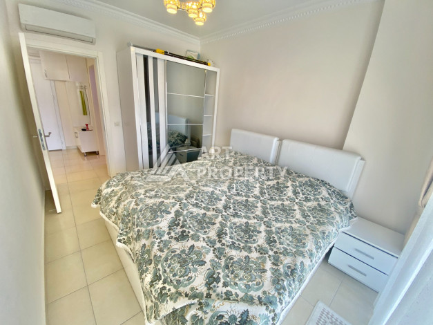 Апартаменты в одном из лучших жилых комплексов в районе Махмутлар планировки 1+1, 55м2 - Ракурс 19