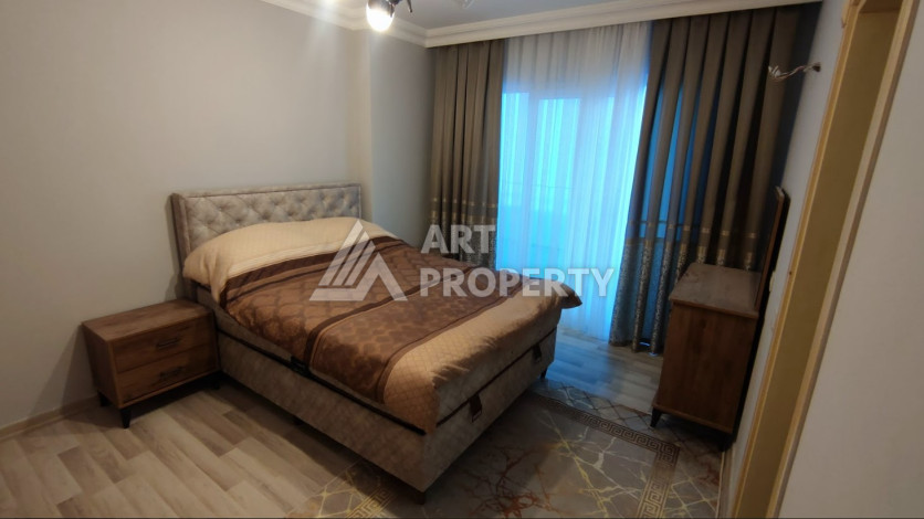 Меблированные апартаменты с просторным балконом  планировки 2+1 в районе Махмутлар, 110м2 - Ракурс 9