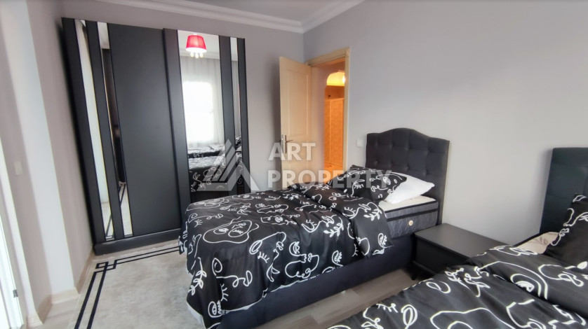 Меблированные апартаменты с просторным балконом  планировки 2+1 в районе Махмутлар, 110м2 - Ракурс 11