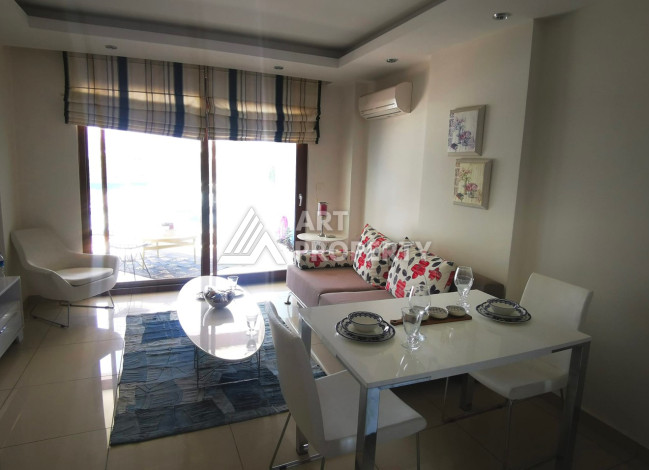 Апартаменты 1+0, 75м2, с большой террасой, в центральном районе Джикджилли - Ракурс 9