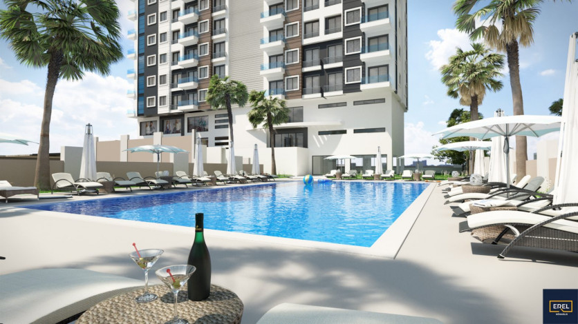 Инвестиционный проект в Махмутларе на центральной улице Барбарос в 150 м от моря, 85-168 м2 - Ракурс 25