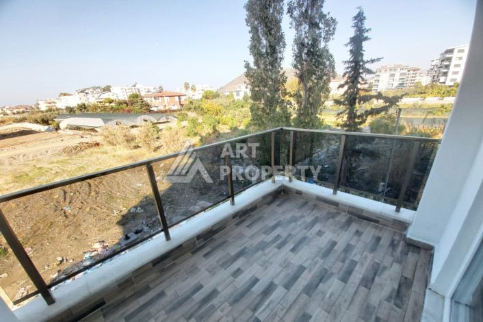 Апартаменты в инвестиционно-привлекательном районе Газипаша планировки 1+1, 65м2 - Ракурс 2