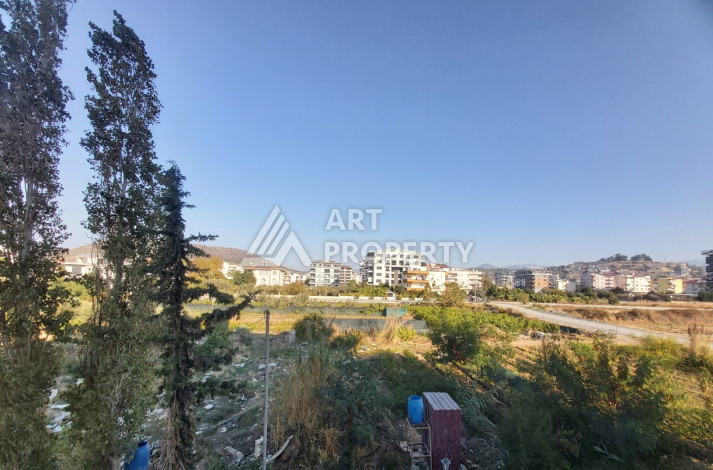 Апартаменты в инвестиционно-привлекательном районе Газипаша планировки 1+1, 65м2 - Ракурс 9