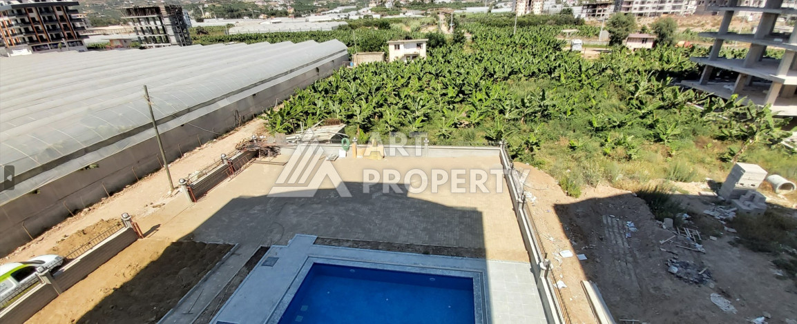 Апартаменты с видом на горы в новом доме планировки 1+1, 55м2. Каргыджак - Ракурс 2