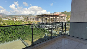 Апартаменты с видом на горы в новом доме планировки 1+1, 55м2. Каргыджак - Ракурс 4