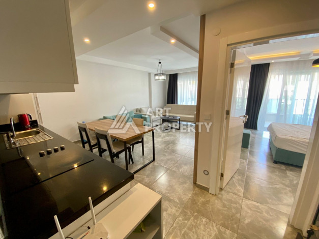 Меблированная квартира в комплексе с богатой инфраструктурой планировки 1+1 в районе Каргыджак, 52м2 - Ракурс 4