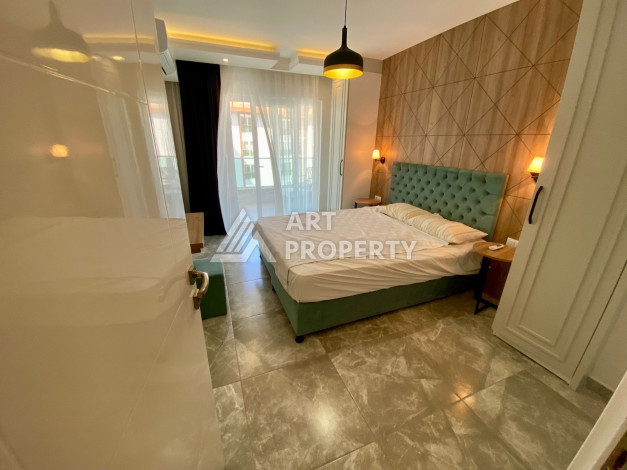 Меблированная квартира в комплексе с богатой инфраструктурой планировки 1+1 в районе Каргыджак, 52м2 - Ракурс 12