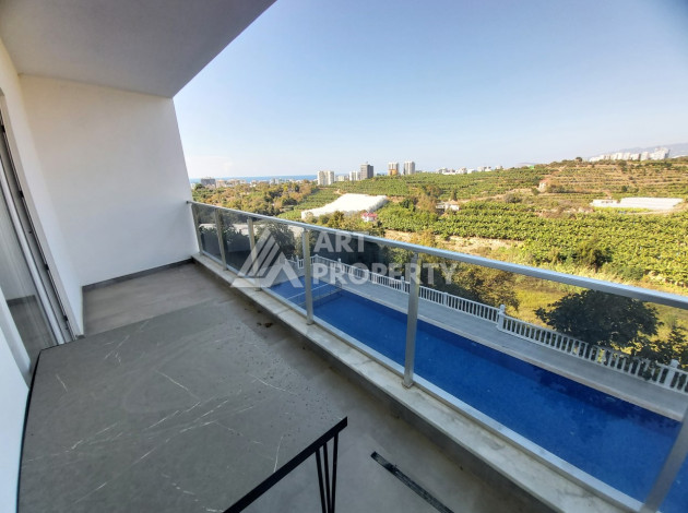 Меблированные апартаменты в современном жилом комплексе с развитой инфраструктурой в районе Каргыджак, 1+1, 65м2 - Ракурс 2