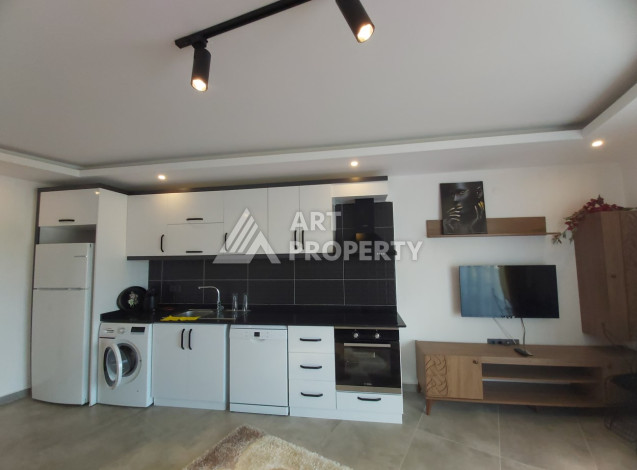 Меблированные апартаменты в современном жилом комплексе с развитой инфраструктурой в районе Каргыджак, 1+1, 65м2 - Ракурс 4