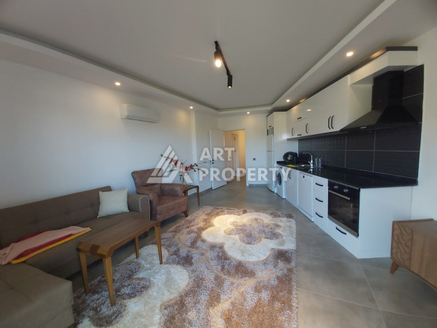 Меблированные апартаменты в современном жилом комплексе с развитой инфраструктурой в районе Каргыджак, 1+1, 65м2 - Ракурс 6