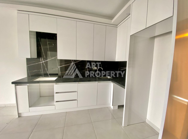 Квартира в новом комплексе с развитой инфраструктурой в районе Махмутлар планировки 1+1, 50м2 - Ракурс 4