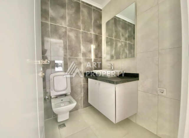 Квартира в новом комплексе с развитой инфраструктурой в районе Махмутлар планировки 1+1, 50м2 - Ракурс 5