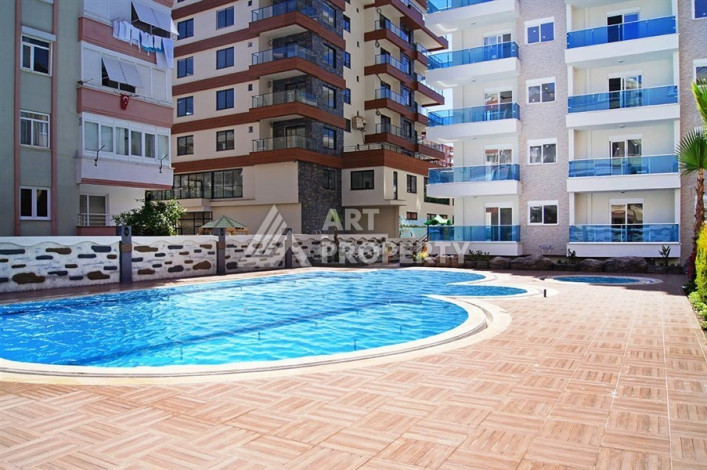 Дизайнерские апартаменты планировки 1+1 в центре Махмутлара, 70м2 - Ракурс 2