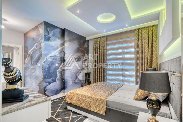 Дизайнерские апартаменты планировки 1+1 в центре Махмутлара, 70м2 - Ракурс 12