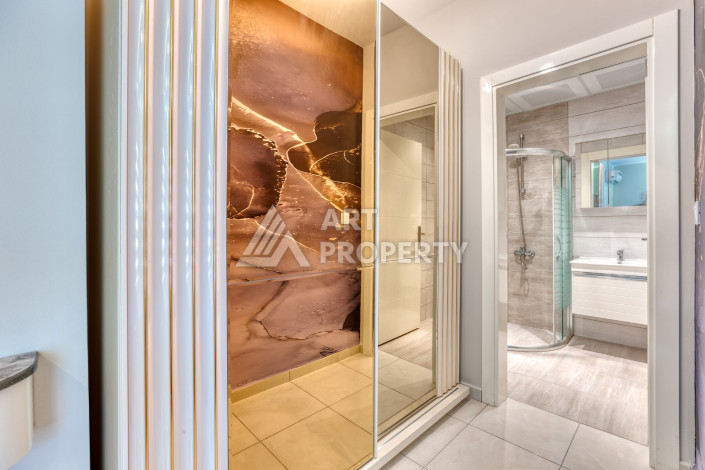 Дизайнерские апартаменты планировки 1+1 в центре Махмутлара, 70м2 - Ракурс 16