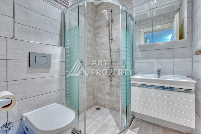 Дизайнерские апартаменты планировки 1+1 в центре Махмутлара, 70м2 - Ракурс 17