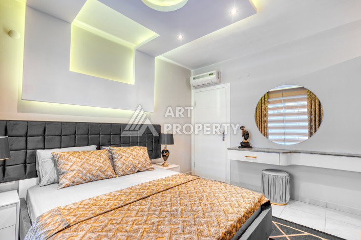 Дизайнерские апартаменты планировки 1+1 в центре Махмутлара, 70м2 - Ракурс 18