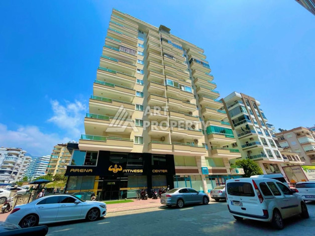 Просторные апартаменты планировки 1+1 в районе Махмутлар, 75 м2 - Ракурс 2