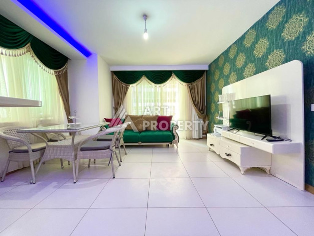 Просторные апартаменты планировки 1+1 в районе Махмутлар, 75 м2 - Ракурс 5