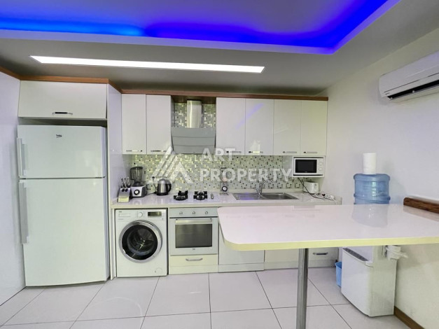 Просторные апартаменты планировки 1+1 в районе Махмутлар, 75 м2 - Ракурс 9