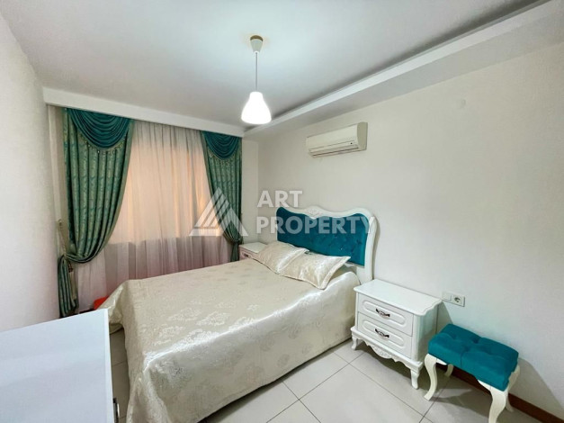 Просторные апартаменты планировки 1+1 в районе Махмутлар, 75 м2 - Ракурс 11