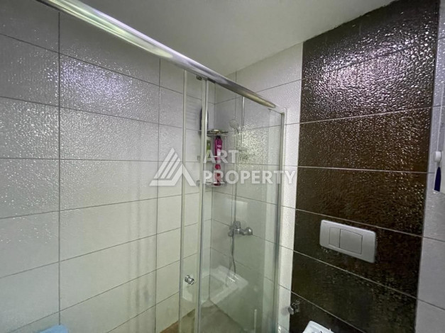 Просторные апартаменты планировки 1+1 в районе Махмутлар, 75 м2 - Ракурс 22