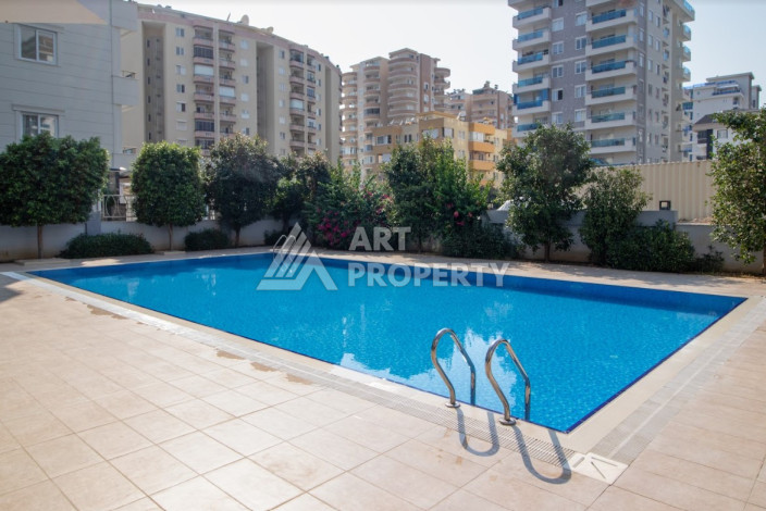 Меблированные апартаменты планировки 1+1 в районе Махмутлар, 75м2 - Ракурс 2