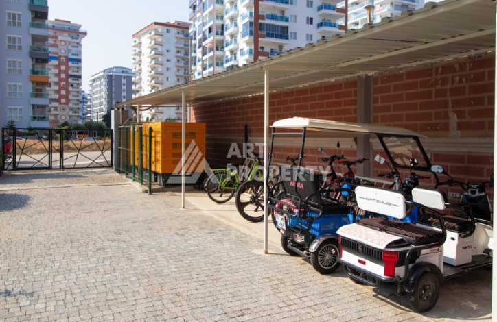 Меблированные апартаменты планировки 1+1 в районе Махмутлар, 75м2 - Ракурс 3