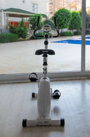 Меблированные апартаменты планировки 1+1 в районе Махмутлар, 75м2 - Ракурс 6