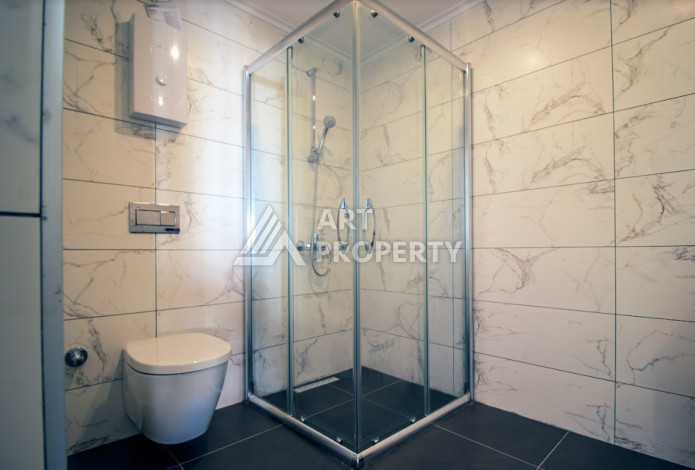 Меблированные апартаменты планировки 1+1 в районе Махмутлар, 75м2 - Ракурс 11