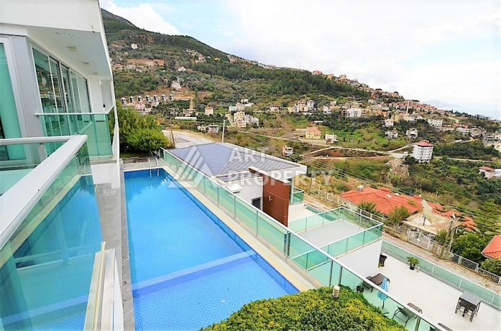 Шикарная и современная вилла с великолепным видом в районе Тепе в Алании. Планировка 4+2, 366м2 - Ракурс 27