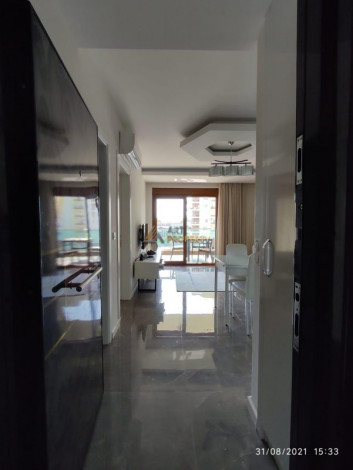 Двухкомнатная квартира в 300 метрах от моря в Махмутлар, 65 м2 - Ракурс 4