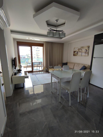 Двухкомнатная квартира в 300 метрах от моря в Махмутлар, 65 м2 - Ракурс 6