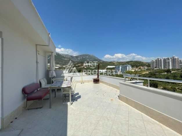 Апартаменты с просторной террасой и видом на море планировки 3+1 в районе Махмутлар, 185м2 - Ракурс 5