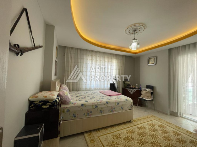 Апартаменты с просторной террасой и видом на море планировки 3+1 в районе Махмутлар, 185м2 - Ракурс 22