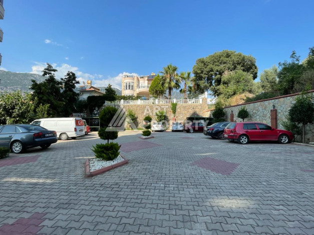 Апартаменты с просторной террасой и видом на море планировки 3+1 в районе Махмутлар, 185м2 - Ракурс 26