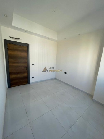 Двухкомнатная квартира в комплексе с инфраструктурой уровня 5-ти звездочного отеля в Махмутлар, 50м2 - Ракурс 6